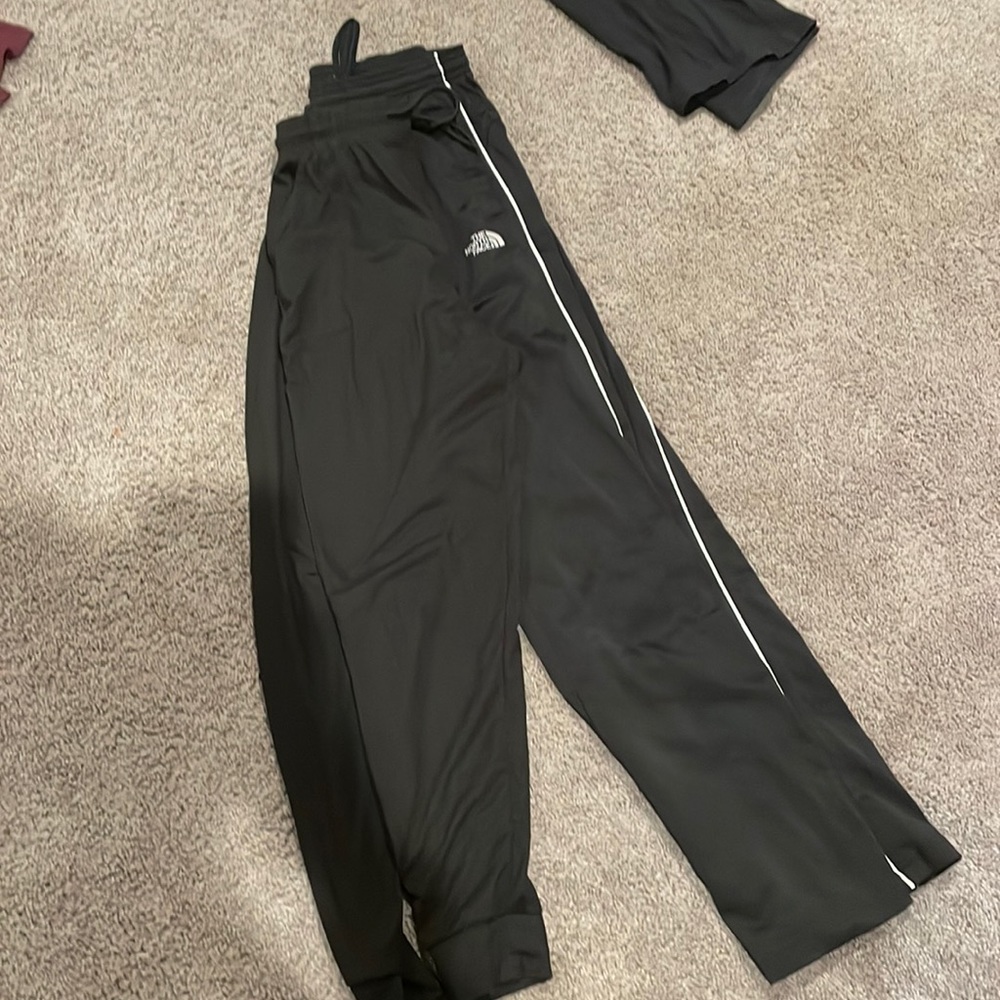 The north face sweatpants and black regular jogging pants